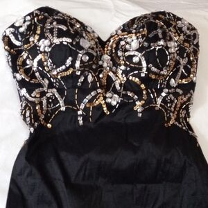 Elegant Black Strapless Dress with Gold and Silver Accents